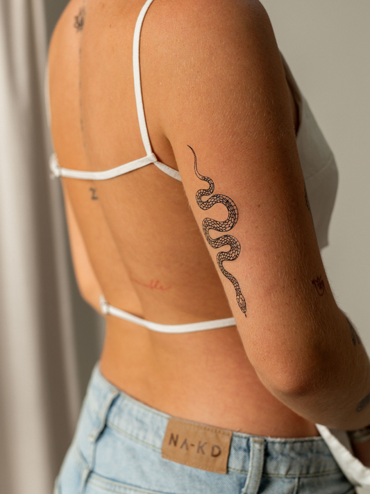 Bovenarm tattoo: inspiratie, stijlen en tips voor de perfecte tatoeage